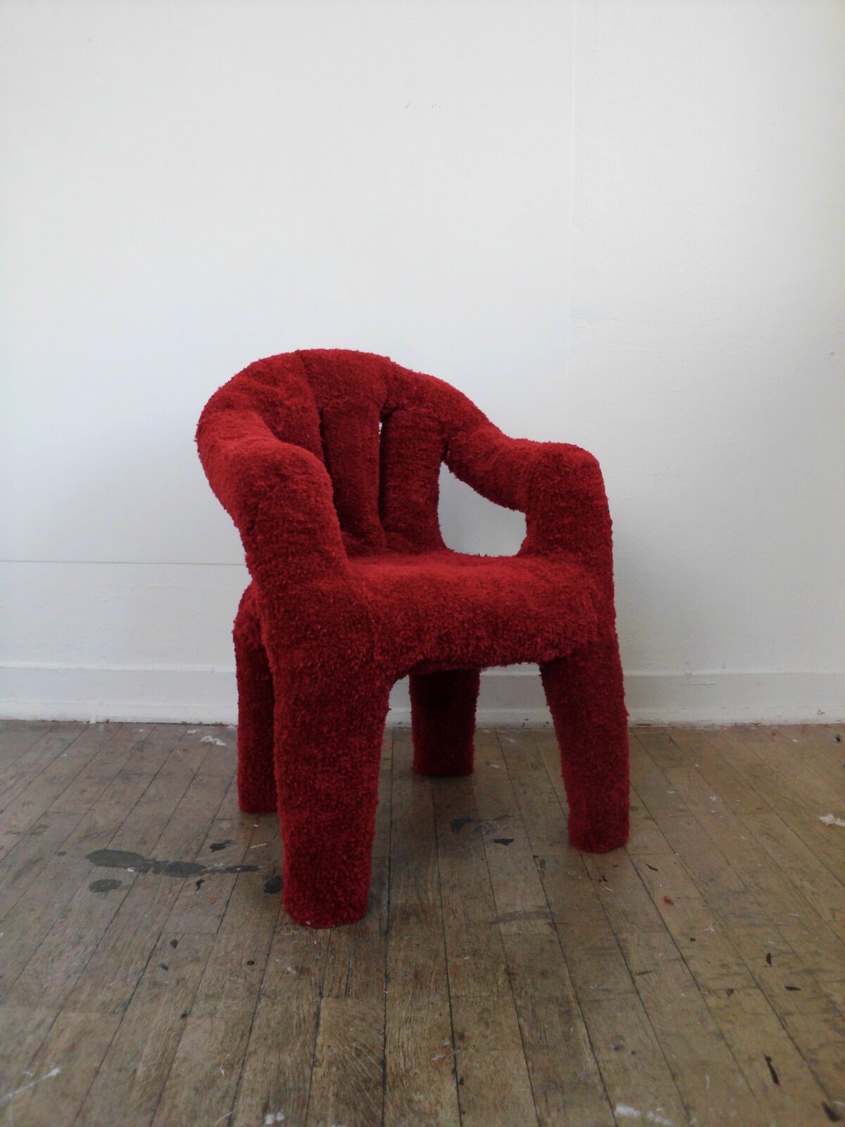La Sedia: a monobloc chair covered entirely in deep red wool